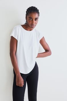 The Tuck-In Tee is a basic tee with a slightly loose fit. Soft with a slight stretch, this top is a pillar wardrobe piece. Has a rounded hem, with a slighty longer back -- perfect for tucking in the front. Relaxed fit Ribbed fabric Round neck Short sleeves Meant to be tucked in the front (but you can wear it as is too!) Basic Tee, Ribbed Fabric, Fashion Forward, Round Neck, Loose Fitting, Short Sleeves, Relaxed Fit, Wardrobe, Fabric