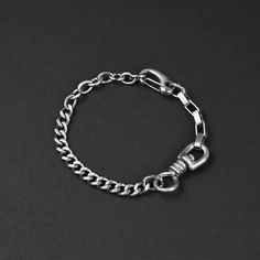 This men's Project Chain Bracelet is an unique addition to your wrist accessories. This men's bracelet is waterproof, tarnish proof and hypoallergenic - no green skin! Men's wrist sizes from 7.25 to 7.75 inches in circumference are perfect for this bracelet. 12mm and 6.5mm chains Bracelet length 8.5 inches Made of stainless steel Matte silver finish Learn how to measure your wrist here: https://www.youtube.com/watch?v=ypiuua7PR8o   ► International orders are subject to tax/duty fees. This is uncontrollable on our end. Shipping can take up to 6 weeks due to customs. ► There are no returns/exchanges on sale items, personalized items, earrings, and custom length chains. ► For more information, please read our shop policies here on Etsy. Adjustable Link Chain Bracelet With Hooks, Adjustable Chain Link Bracelet With Hooks, Adjustable Link Chain Bracelet With Hook And Links, Silver Stainless Steel Bracelets With Hook And Links, Silver Adjustable Chain Bracelet With Hook And Links, Adjustable Silver Chain Bracelet With Hook And Links, Chains Bracelet, Mens Chain Bracelet, Wrist Accessories