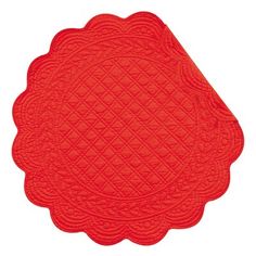 a red placemat with an intricate design on the center and sides, in front of a white background