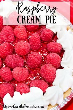 raspberry cream pie with whipped cream and fresh raspberries in the crust