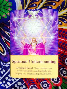 a card with an image of a person holding up the sacred symbol in front of it