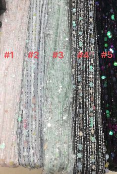 We offer a variety of fashion handmade fabric，those are widely use for wedding dress，garment and fashion cloth. we sell it by yard，our minimum order is 1 yards，and we always package it 15 yards for one roll，the width is 130cm/51 inch Material ： mesh ，Rayon,polyester. Symmetrical embroidery floral pattern, with lovely flowers in the middle, scalloped border. You can also cut and use separately. Perfect for dress, tops, wedding veil. You can split the piece up and have one scalloped edge around th Crochet Lace Tulle Fabric For Party, Sequin Tulle Fabric For Summer Parties, Glamorous Party Tulle Lace Fabric, Glamorous Lace Tulle Fabric For Party, Summer Lace Sequin Fabric, Green Lace Sequin Fabric For Party, Party Tulle Fabric With Crochet Lace, Elegant Multicolor Lace Sequin Fabric, Elegant Multicolor Sequin Lace Fabric