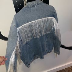 Never Worn, Nwt, M But Fits Large. Super Cute! Make An Offer (: Blue Fringe Outerwear For Fall, Blue Fringe Outerwear For Spring, Trendy Blue Fringed Outerwear, Trendy Blue Fringe Outerwear, Jean Jacket With Fringe, Fleece Lined Denim Jacket, Spring Denim Jacket, Light Wash Jean Jacket, Chambray Jacket