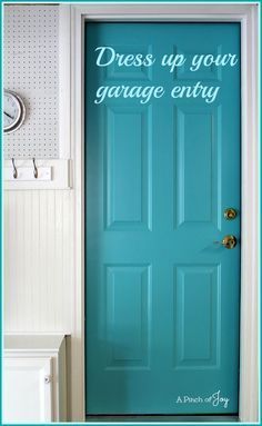 a blue door with the words dress up your garage entry written on it in white