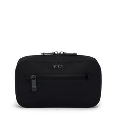 An innovatively welded construction gives this travel case a slim, water and abrasion-resistant finish. Black Rectangular Travel Accessories With Zipper Closure, Black Travel Case With Zipper, Black Travel Cases With Zipper Pocket, Black Nylon Travel Cases, Black Rectangular Case With Zipper Closure, Travel Case, Tech Accessories, Wallet, Black