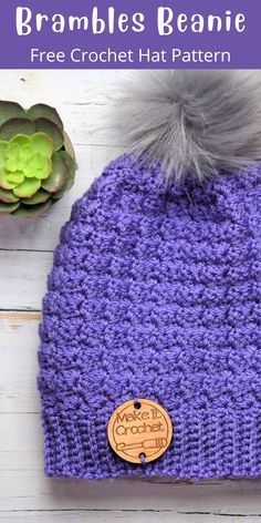 a crochet beanie with a wooden button on it and the text, free crochet hat pattern