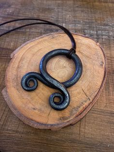 **Please let me know if you would like leather cord or vegan suede when ordering** This listing is for a viking troll cross pendant, made by myself, here at the forge. After tickling it into shape with a hammer, I then treat it with a mix of beeswax and linseed oil for a lovely shiny black finish. Please note: these items are made to order, and due to the nature of hand forged items, may differ from the listing picture. If you like the look of my work but don't see anything in my listings that t Cross Hands, The Forge, Viking Pendant, La Forge, Viking Necklace, Hand Forged Iron, Forged Iron, Linseed Oil, Cross Pendant Necklace