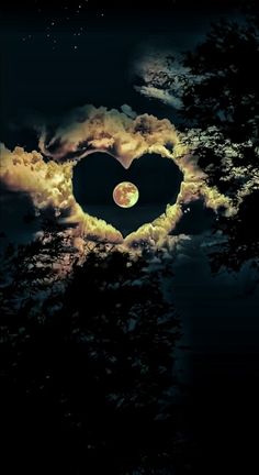 a heart shaped tree with the moon in the background