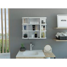 a white bathroom sink sitting next to a shelf filled with personal care items on top of it