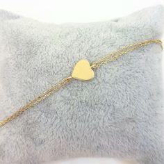 -The heart bracelet is made with high quality 14K real solid gold. The size of the heart is 8mm X 8mm. There is double chain. - This tiny, dainty, charm, delicate and trendy bracelet has been artfully designed for timeless yet modern millennial fashion. - You receive the bracelet in a beautiful and free gift box. - The bracelet length is 7 inches. We can shorten it. just write on personelized ares. - Free shipping (Arrive within 4 business days to USA and Canada ( 1 day for production + 3 days f Adjustable Yellow Gold Chain Bracelet For Valentine's Day, Adjustable Tarnish Resistant Yellow Gold Heart Bracelet, Adjustable Yellow Gold Heart Bracelet For Anniversary, Gold Chain Bracelet For Friendship On Valentine's Day, Adjustable 14k Yellow Gold Heart Bracelet, Adjustable Tarnish-resistant Heart Bracelet Gift, Heart Shaped Charm Bracelet For Valentine's Day Birthday, Heart Charm Bracelet For Valentine's Day Birthday, Heart-shaped Charm Bracelet For Valentine's Day Birthday