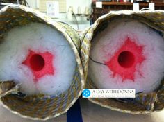 the inside of two baskets with red and white yarn on them, one is open