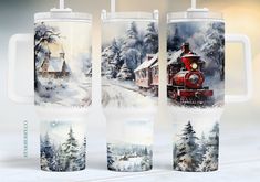 three travel mugs with images of a train on the front and side, one is full of snow