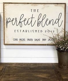 a sign that says the perfect blend established 2013 on it next to a potted plant