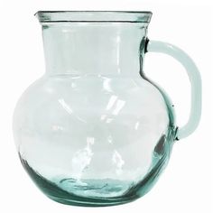 a clear glass pitcher is shown on a white background with the handle extended to hold water