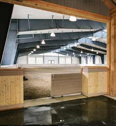 an empty horse barn with no people in it