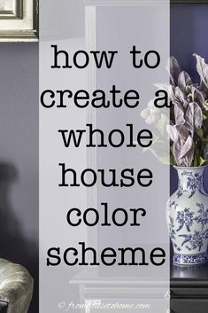 a blue and white vase sitting on top of a table next to a mirror with flowers in it