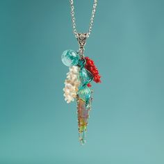 "This Teal ocean necklace is made of glass in the lampwork technique, each bead is hand blown and unique. This Nautical necklace is lightweight, stylish and elegant and will become a versatile and irreplaceable addition to your everyday outfits! 💕 You will definitely look stunning in this glass mermaid necklace! Dimensions: total pendant height about 2 3/4 inch (70mm). Silver colored metal chain length is adjustable, 16\"-20\" inches (40-50cm). Materials: artist lampwork glass beads, metal fitt Ocean-inspired Silver Glass Necklace, Ocean-inspired Silver Glass Jewelry, Ocean-inspired Multicolor Jewelry Gift, Unique Pendant Beaded Necklaces With Lobster Clasp, Unique Beaded Pendant Necklace With Lobster Clasp, Unique Pendant Beaded Necklace With Lobster Clasp, Unique Glass Necklace For Beach, Unique Turquoise Glass Necklaces, Bohemian Mermaid Necklace For Gifts