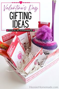 valentine's day gifting ideas in a basket with pink and purple pom - poms