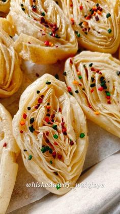 some kind of food that is sitting on a plate with confetti sprinkles