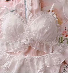 Kawaii Princess White Ruffle Nymphet Lolita 2-piece Lingerie Set featuring soft ruffle-accented bra with cups that are padded with removable inserts to enhance your shape (no underwiring), detailed with a lace ribbon bow with little charm and matching panties. The bra has adjustable straps, so you can customize the fit Material: Bamboo Fiber, Cotton, Polyester, Lycra, Nylon, Acrylic, Viscose Langerai Outfits, Cute Pj Outfits, Soft Kawaii Aesthetic, Lace Ribbon Bow, Cute Lingerie Sets, Kawaii Princess, Deer Doll, White Lace Bra, Fashion Kawaii