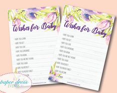 two baby shower games with watercolor flowers on the front and purple, green, yellow and