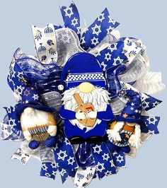 a blue and white wreath with an image of a man in a hat on it