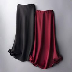 An elegant essential for any woman’s wardrobe, our High Waist Solid Satin Skirt will take your look to the next level. Featuring a high-waisted and flowing silhouette and a tasteful ruffled hem, this skirt is an elevated piece, perfect for the more formal events in your life. Plain Skirt, Mid Calf Skirt, Satin Maxi Skirt, Satin Fashion, Silk Midi Skirt, Formal Skirt, Long Skirts For Women, Half Skirt, Skirt Midi