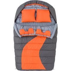 an orange and gray sleeping bag with two pillows