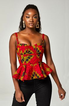 Our sexy African print peplum corset is cut from a bold Ankara wax fabric. This stylish African corset is cut to fit your silhouette perfectly and accentuate a slim waist. A feminine, sophisticated design, our ankara corset features proper corsetry boning for additional support, a detachable adjustable strap and a contrasting gold zipper to the back for easy on. Wear your African print peplum corset with denim and killer heels for a sexy sophisticated look. Shop The Cordelia & Charles Collection African Dresses Modern Ankara Styles, Ankara Tops Blouses, Ankara Corset, Peplum Corset, Ankara Tops, African Tops, African Print Tops, African Dresses Modern, Afrikaanse Mode