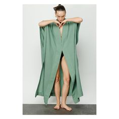 Cara is a cotton crinkle muslin caftan kimono that has a dramatic shape. Details include a substantial hemmed edging that gives the caftan substance and shape. Two hidden metal closures on the front hems keep the modern lines uninterrupted. A lovely fashion selection for day or evening wear. Cara is simplicity at its finest. The colors are blue, green, white, cloud grey, cinnamon, and smoke grey 100% Turkish cotton. One size. V Neck Kaftan, Beach Kaftan, Lovely Fashion, White Cloud, Beach Covers, Beach Wears, Beach Wear, Kimonos, Aza Fashion