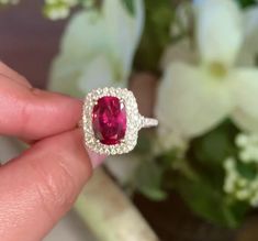 5 CT Red Oval Cut Ruby Diamond 10K 14K 18K Solid White and Rose Gold Engagement Ring Two Diamond Row Around with Main Stone Wedding Ring R I N G M E T A L ✥ Metal : 10K 14K 18K White Yellow and Rose Gold , 925 Sterling Silver ✥ Metal Clarity : Pure ✥ Stamp/Hallmark : Yes M A I N S T O N E S ✥ Type : Ruby Diamond ✥ Shape : Oval Cut ✥ Weight :5 CT ✥ Color : Red ✥ Clarity : VVS1 ✥ Diamond Cut : Excellence S I D E S T O N E ✥ Type : Moissanite Diamond ✥ Shape : Round Cut ✥ Weight : 1.25 CT ✥ Color : White ✥ Diamond Cut : Excellence R I N G S I Z E S ✥ All Ring Size are Available ✥ Free Sizing ✥ If You Have any Questions With Regards to Sizing Please Contact as S H I P P I N G ✥ Free Express Delivery ✥ No Extra Charge For Delivery  ✥ Fastest  Delivery Available As Urgent Requirement P A C K A G Stone Ring Design Gold, Stone Rings Women, Ruby Engagement Ring Gold, Ruby Jewelry Ring, Ruby Stone Ring, Red Diamond Ring, Stone Wedding Ring, Ruby Diamond Ring, Red Stone Ring