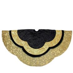 a black and gold brocaded collar with an intricate design on the collarline