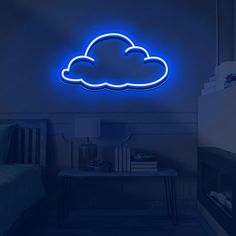 a blue neon sign that says cloud above a bed in a dark room with a nightstand