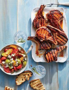 grilled chicken with tomatoes, peppers, and cucumber salad