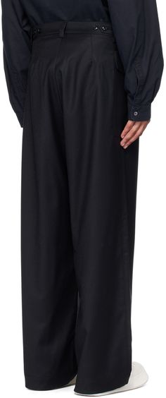 Wide-leg stretch virgin wool flannel trousers. · Mid-rise · Belt loops · Adjustable button tabs at waist · Zip-fly · Flap and patch pocket at outseams Supplier color: Navy Wool Wide-leg Pants With Pockets, Business Wool Wide-leg Pants, Ankle-length Wool Pants With Pockets, Wool Ankle-length Pants With Belt Loops, Wool Ankle-length Pants With Pockets, Wool Pants With Pockets And Tapered Leg, Black Wool Bottoms With Welt Pockets, Flannel Trousers, Wool Flannel