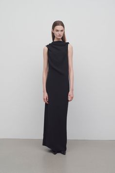 Long, off-the-shoulder dress in fluid silk crepe with folded bateau neckline, draped waistline, and center back slit detail. Silk Dress Back, 2025 Fashion, Draped Neckline, Silk Dress Long, Short Denim, Bateau Neckline, Nassau, Silk Crepe, Womens Fall