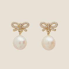 Bow and Pearl Studs | Lightweight Pearl Earrings – Nickel & Suede Formal Pearl Earrings With Bow Detail, Formal Pearl Earrings With Bow, Formal Pearl Jewelry With Bow, Elegant Bow Pearl Earrings, Elegant Bow Earrings For Formal Occasions, Elegant Formal Earrings With Bow, Wedding Pearl Drop Earrings With Bow, Classic Gold Bow Earrings, Classic Bow Earrings For Party