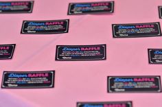 there are many labels on the pink fabric