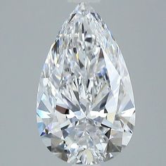 a pear shaped diamond on a gray background