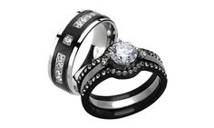 two wedding rings with black and white diamonds on them, one has a princess cut diamond in the center