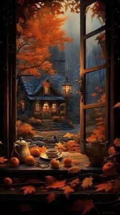 an open window with autumn leaves surrounding it and a house in the background that is lit up at night