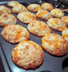 some biscuits are sitting on a pan and ready to be cooked in the oven for consumption