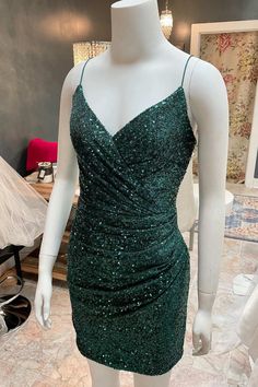 Modsele dark green sequined short party dress features V-neckline, spaghetti straps and ruched side.
Product Details:

SKU:PD2754
Sequins material
Mini length
Size: US 0- 16. Check our Size Chart to get your correct size. 
Recommend custom size for plus size.
Free custom size service is available. Email your exact measurements once order is placed. 
Fully lined & Built with bra
Time: 10-15 business days. 

Feel free to contact our customer service: contact@modsele.com if you have any questions. Dark Green Hoco Dress, Dress Mini Prom, Cocktail Dress Mini, Green Hoco Dress, Nye Party Dresses, Hoco Dresses Green, Green Homecoming Dresses, Mini Prom Dresses, Hoco Dress