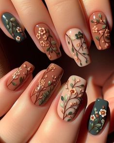 Obsessed with all things earthy? This forest-themed floral nail art featuring tiny flowers and vines in cool browns and mossy greens is the perfect way to show off your love for nature. (Floral Nail Art Ideas) Boho Nails Coffin, Flower Nails Natural, Engagement Nails Floral, Nature Themed Nail Art, Green And Brown Nail Designs, Earthy Nail Ideas, Brown Nails For Fall, Forest Wedding Nails, Forest Themed Nails