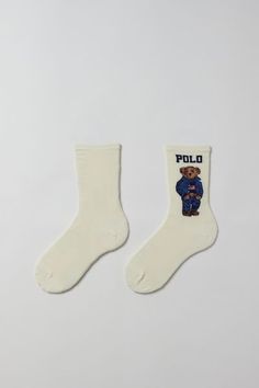 So soft socks from Polo Ralph Lauren with their signature bear design. Cut in an essential crew length. Content + Care 60% Cotton, 21% nylon, 17% polyester, 2% spandex Machine wash Imported Size + Fit Crew length | Polo Ralph Lauren Americana Sport Bear Crew Sock in Ivory, Women's at Urban Outfitters Crew Socks Aesthetic, Ralph Lauren Bear Socks, Polo Ralph Lauren Socks, Cute Crew Socks, Polo Bear Socks, Ralph Lauren Americana, Y2k Socks, Polo Socks, Ralph Lauren Socks