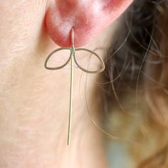 Sweet botanical earrings with a modern edge. These delicate petal threaders are subtle enough to wear everyday, with an interesting and somewhat unexpected design that you won't get tired of. 1/2" open petal shape dangles with fixed wire threader ear wire. Available in sterling silver, 14k gold fill (as shown), or mixed metal. All Rebecca Haas Jewelry is handcrafted by me in my Southern Vermont Studio from recycled and ethically sourced materials. Silver 14k Gold Threader Earrings With Ear Wire, Delicate Nickel-free Drop Threader Earrings, Delicate Nickel-free Threader Drop Earrings, Delicate Gold Sterling Silver Threader Earrings, Delicate Pierced Threader Earrings For Everyday, Delicate Everyday Threader Earrings, Delicate Long Drop Threader Earrings, Dainty Handmade Teardrop Threader Earrings, Delicate Teardrop Linear Earrings For Everyday