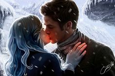 a man and woman kissing in the snow