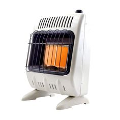 a white heater sitting on top of a white table next to a black and orange object