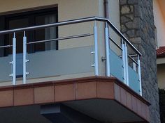 a building with a balcony and balconies on it