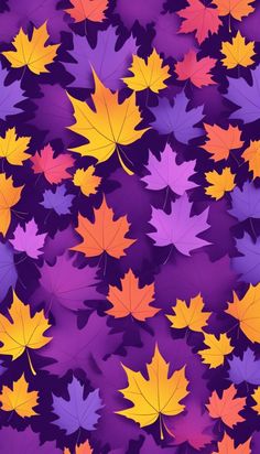 many different colored leaves on a purple background